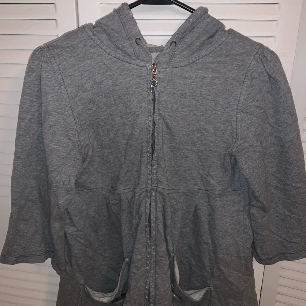 Boutique Style half sleeve zip up jacket.